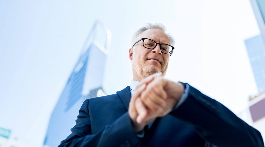 senior-businessman-checking-time-on-his-PGPN5MF(1) senior-businessman-checking-time-on-his-PGPN5MF(1)