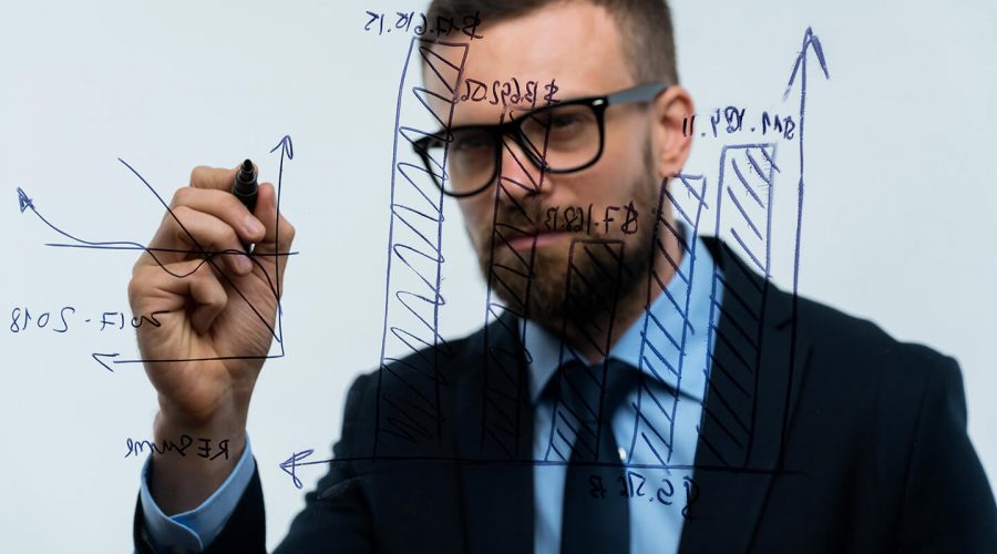 man-draws-various-growth-charts-calculating man-draws-various-growth-charts-calculating